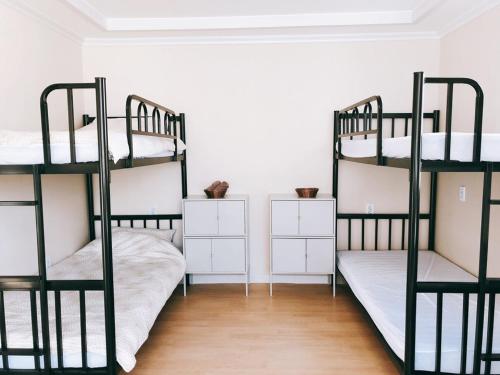 Postel nebo postele na pokoji v ubytování ANC HOUSE