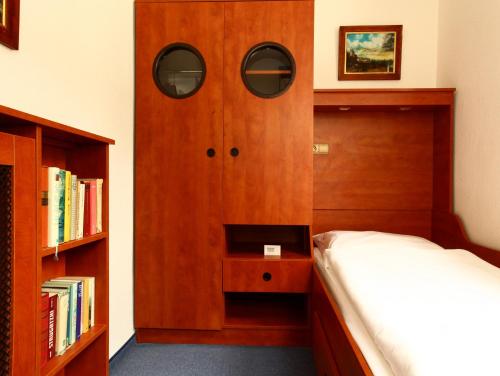 Postel nebo postele na pokoji v ubytování Hotel Bellmoor im Dammtorpalais