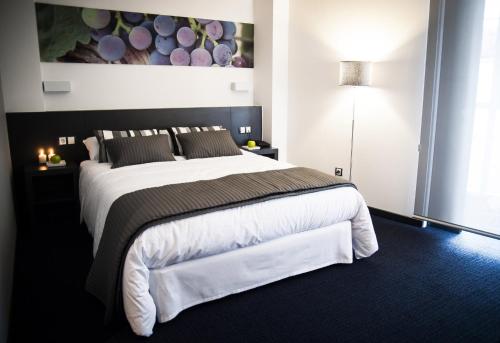Postel nebo postele na pokoji v ubytování Hotel Forum Evolución