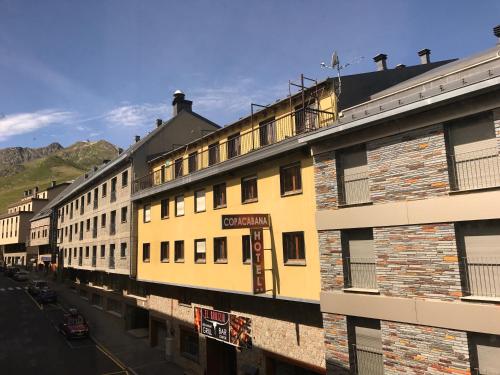 a row of buildings on the side of a street at Apartamentos Grifovacances Consuegra 1 in Pas de la Casa