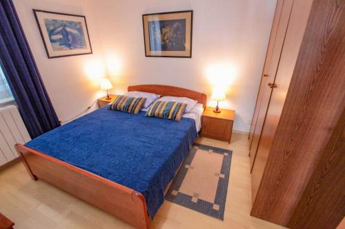 Ένα ή περισσότερα κρεβάτια σε δωμάτιο στο Vila Pinet