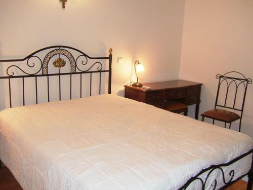 Katil atau katil-katil dalam bilik di "O Viajante" Low Cost Hotel
