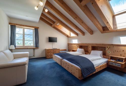Postel nebo postele na pokoji v ubytování Hotel Maria