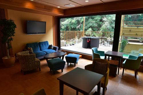 Gallery image of Hananosato Onsen Sansuikan in Takatuki