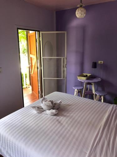 Postel nebo postele na pokoji v ubytování Sukhothai Indy Resort