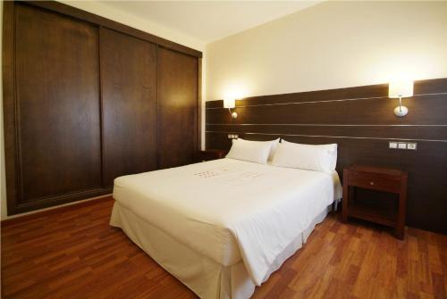 Ένα ή περισσότερα κρεβάτια σε δωμάτιο στο Apartamentos Ardales