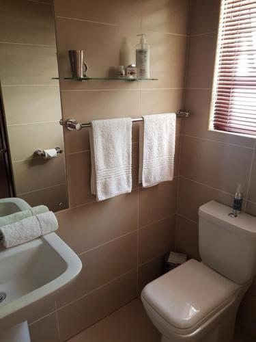 Ένα μπάνιο στο Presidensie Guest Rooms