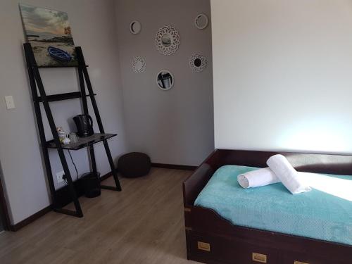 a room with a bed and a ladder in it at Venti Dell'Est in Westbrook