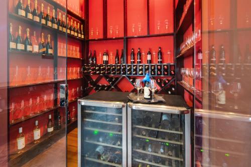 a wine tasting room with a bunch of wine bottles at Jewel Grande Montego Bay Resort and Spa in Montego Bay