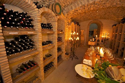 a wine cellar with a bunch of wine bottles at Hotel Villa Cimbrone in Ravello