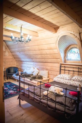 a bedroom with two bunk beds in a room at Rezydencja Sąsiadów Zakopanego in Zakopane