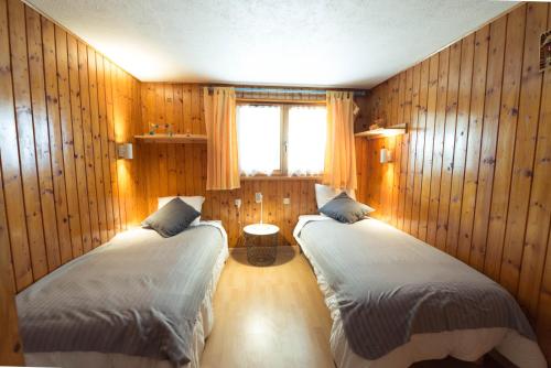 Postel nebo postele na pokoji v ubytování Chalet des sorbiers