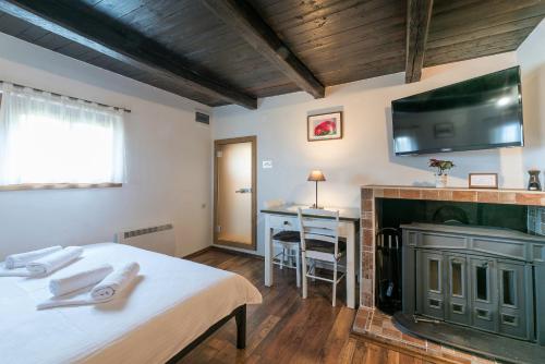 Posteľ alebo postele v izbe v ubytovaní Holiday home Podgaj