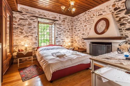 Postel nebo postele na pokoji v ubytování Archontiko Montana