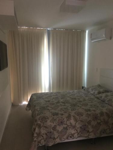 Lova arba lovos apgyvendinimo įstaigoje Apartamento Super Luxo em Arraial do Cabo