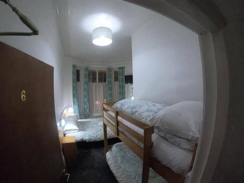 a bedroom with a bunk bed in a room at The Danescourt in Blackpool