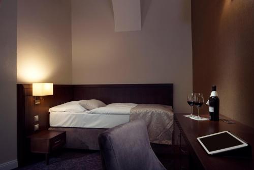 Hotel Ambassadorにあるベッド