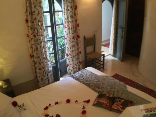 Un ou plusieurs lits dans un hébergement de l'établissement Riad of The Light