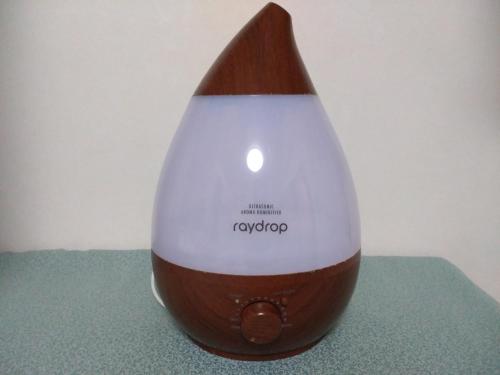 a brown and white vase sitting on a table at At Home N23 in Sapporo