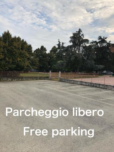 an empty parking lot with the words paraccoipediaipedia fire parking at La Porta Nel Giardino in Asti