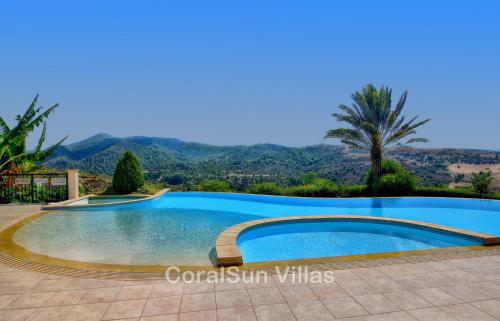Bazén v ubytování ELITE Amazing Villa with Heated Pool by Coral Sun Villas nebo v jeho okolí
