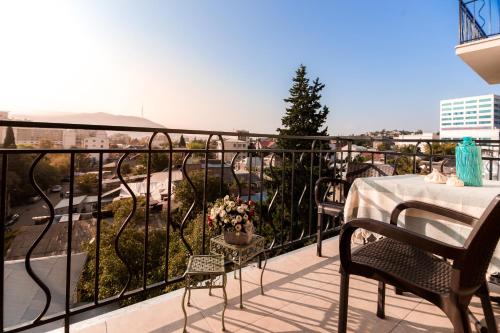 Un balcón o terraza en Dat Exx Apartments