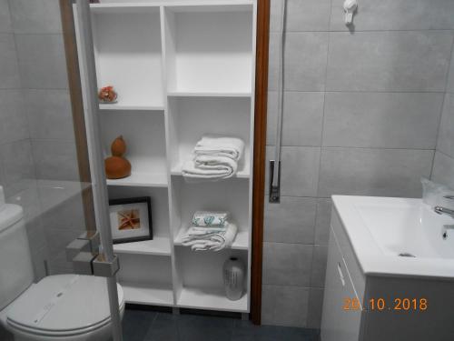 Ein Badezimmer in der Unterkunft Sinos Rio Tinto