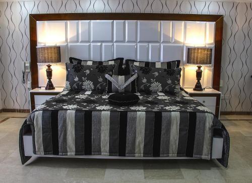 Een bed of bedden in een kamer bij Hotel Ingenio Reina Isabel