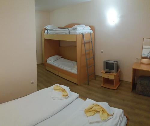 Postel nebo postele na pokoji v ubytování Comfort Guest House