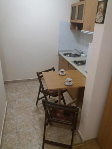Kuchyň nebo kuchyňský kout v ubytování Comfort Guest House