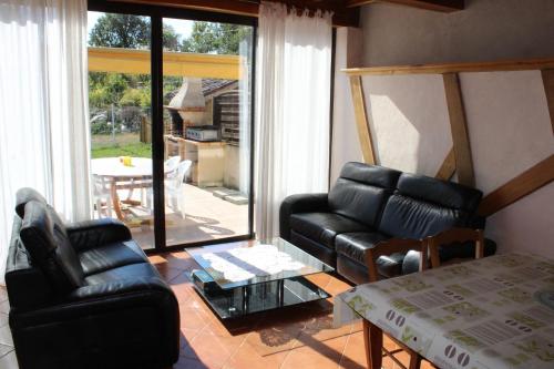 Posezení v ubytování Gîte Bois et Senteurs