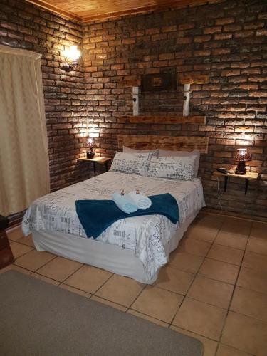 Postel nebo postele na pokoji v ubytování Thandamanzi Self Catering