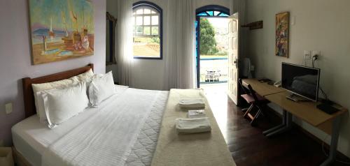 Ein Bett oder Betten in einem Zimmer der Unterkunft Abigail Condé