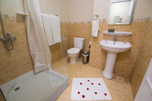Koupelna v ubytování Mutrah Hotel