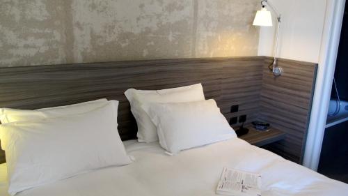 Postel nebo postele na pokoji v ubytování Hotel & Resort Le Colombare