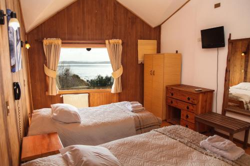 Postel nebo postele na pokoji v ubytování Hotel Faros del Sur