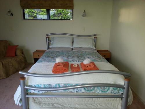 Ένα ή περισσότερα κρεβάτια σε δωμάτιο στο Ridgehaven Accommodation