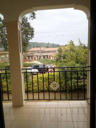 an open balcony with a view of a parking lot at Rena Akasha Establishments in Kyenjojo