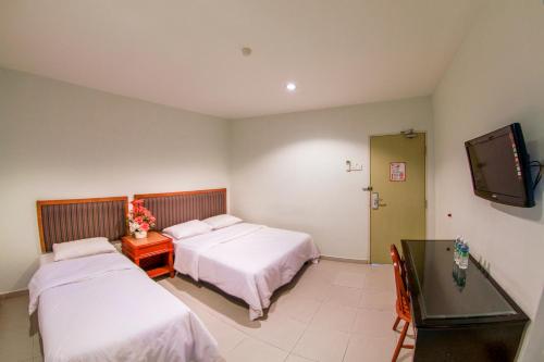 Postel nebo postele na pokoji v ubytování Hotel Rembia
