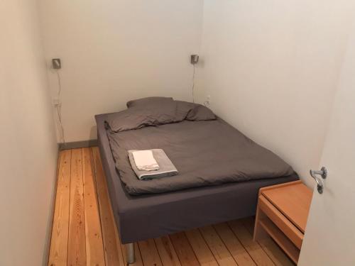 Postel nebo postele na pokoji v ubytování Kongebrogade 77