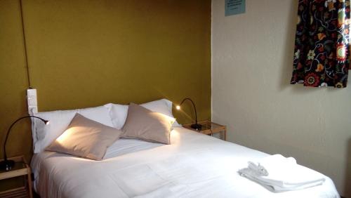 Ein Bett oder Betten in einem Zimmer der Unterkunft Refugi Cap del Rec