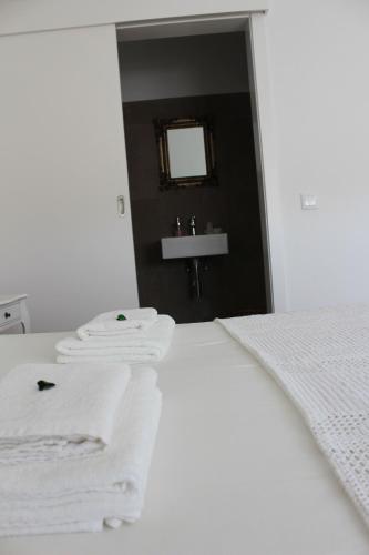 מיטה או מיטות בחדר ב-HappySintra GuestHouse by Casa do Preto