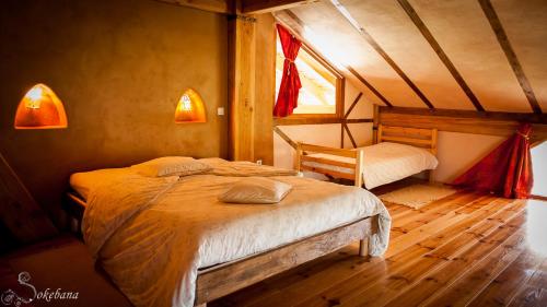 Katil atau katil-katil dalam bilik di Le Nid des Anges