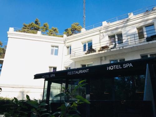 a hotel spa sign in front of a building at SPA Hotel in Vorzelʼ