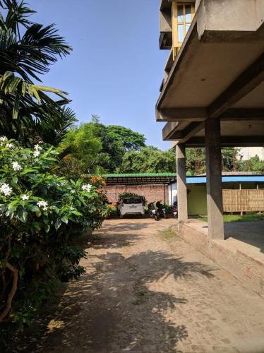 a car parked in the driveway of a house at Cozy Living in Guwahati