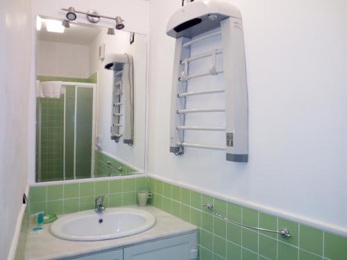 a bathroom with a sink and a mirror at B&B Al Centro Storico in Agrigento