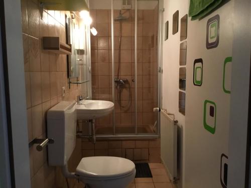 Ένα μπάνιο στο Ferienwohnung Leitner