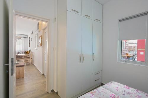 Ένα ή περισσότερα κρεβάτια σε δωμάτιο στο Apartment Kotor Bay