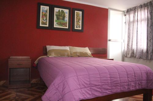 Postel nebo postele na pokoji v ubytování Hostal Florencia