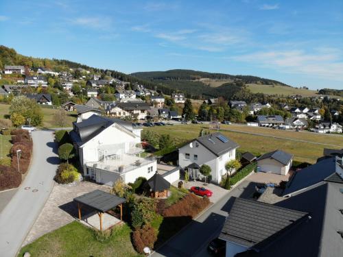 an aerial view of a small town with houses at Ferienwohnung Sommerwind in Willingen